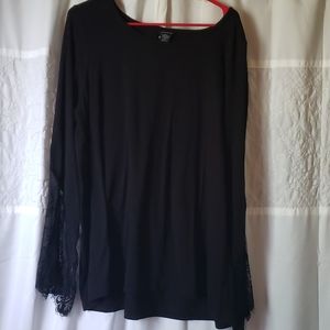 Black Torrid top with lace sleeve.